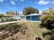 Nice blue house with a yard and a long driveway at 1644 24Th N Ave, St Petersburg, FL 33713