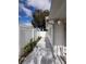 Side of the house with a walkway and white fence at 1644 24Th N Ave, St Petersburg, FL 33713