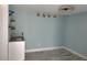 Small wet bar with granite countertop and white cabinets at 1644 24Th N Ave, St Petersburg, FL 33713