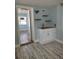 View of a small wet bar and a glimpse of another room at 1644 24Th N Ave, St Petersburg, FL 33713