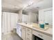 Bathroom with shower/tub combo, vanity with drawers, and a clean aesthetic at 1810 E Palm Ave # 7305, Tampa, FL 33605