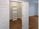 Spacious walk-in closet with built-in shelving at 1910 E Palm Ave # 11208, Tampa, FL 33605