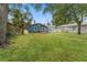 Charming bungalow with a lush green lawn and mature trees at 1927 13Th S St, St Petersburg, FL 33705