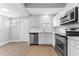 Modern kitchen featuring stainless steel appliances and white shaker cabinets at 1927 13Th S St, St Petersburg, FL 33705