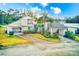 Two-story home with attached garage and landscaped yard at 2579 Forest Run Ct, Clearwater, FL 33761