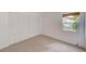 Bedroom with large closet and window at 2579 Forest Run Ct, Clearwater, FL 33761