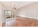 Open living area with tile floors, high ceilings, and patio access at 2579 Forest Run Ct, Clearwater, FL 33761