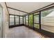 Spacious screened porch with brick flooring at 2579 Forest Run Ct, Clearwater, FL 33761