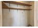 Empty storage room with simple wooden shelving at 2579 Forest Run Ct, Clearwater, FL 33761