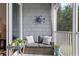 Peaceful balcony with comfy seating and coastal decor at 3192 Nautical S Pl, St Petersburg, FL 33712