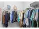 Walk in closet with shelving and hanging clothes at 3192 Nautical S Pl, St Petersburg, FL 33712