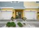 Front view of townhome with two-car garage at 3192 Nautical S Pl, St Petersburg, FL 33712