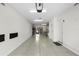 Spacious garage with overhead storage and door at 3192 Nautical S Pl, St Petersburg, FL 33712