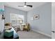 Bright home office with window, desk, and chair at 3192 Nautical S Pl, St Petersburg, FL 33712