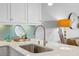 Kitchen sink and countertop detail with modern fixtures at 3192 Nautical S Pl, St Petersburg, FL 33712