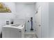 Laundry room with washer, dryer, and ample storage at 3192 Nautical S Pl, St Petersburg, FL 33712