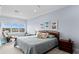 Spacious main bedroom with water views and relaxing decor at 3192 Nautical S Pl, St Petersburg, FL 33712