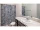 Bathroom with shower, toilet and patterned curtain at 3345 Pleasant Willow Ct, Brandon, FL 33511