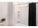 Shower stall with black shower curtain at 3345 Pleasant Willow Ct, Brandon, FL 33511