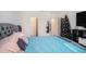 Main bedroom with large bed, walk-in closet, and ensuite bathroom at 3345 Pleasant Willow Ct, Brandon, FL 33511