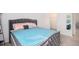 Main bedroom with large bed, walk-in closet, and ensuite bathroom at 3345 Pleasant Willow Ct, Brandon, FL 33511