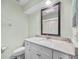 Clean bathroom with vanity, toilet and shower at 4234 Golf Club Ln, Tampa, FL 33618