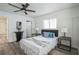 Bright bedroom with ceiling fan and neutral decor at 500 Randolph Rd, Venice, FL 34293