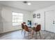 Bright dining room featuring a glass table and ample natural light at 500 Randolph Rd, Venice, FL 34293