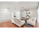 Light and airy living room with hardwood floors and white walls at 500 Randolph Rd, Venice, FL 34293