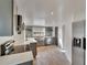 Modern kitchen with gray cabinets and quartz countertops at 5028 School Rd, Land O Lakes, FL 34638