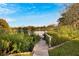 Peaceful lakefront property with private dock access at 5028 School Rd, Land O Lakes, FL 34638