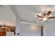 Bright dining room with ceiling fan and view into kitchen at 5440 Sandy Shell Dr, Apollo Beach, FL 33572