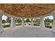 Open-air gazebo with wooden beams and a view at 5440 Sandy Shell Dr, Apollo Beach, FL 33572