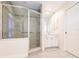 Clean bathroom with a walk-in shower and updated fixtures at 728 Thistlelake Dr, Venice, FL 34293