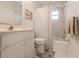 Simple bathroom with a shower/tub combo and updated vanity at 728 Thistlelake Dr, Venice, FL 34293