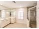 Elegant bathroom with a large shower and double vanity at 728 Thistlelake Dr, Venice, FL 34293