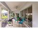 Bright screened porch offers extra space for relaxing and entertaining at 728 Thistlelake Dr, Venice, FL 34293