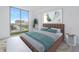 Main bedroom with a brown bed and city views at 777 3Rd N Ave # 1607, St Petersburg, FL 33701