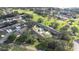 Aerial view of community near golf course at 8041 Green Pines Ter, Spring Hill, FL 34606