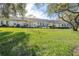 Landscaped backyard providing ample green space at 8041 Green Pines Ter, Spring Hill, FL 34606
