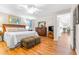 Spacious Primary bedroom with wood floors and ample natural light at 8041 Green Pines Ter, Spring Hill, FL 34606