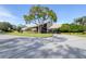 Exterior view of community clubhouse at 8041 Green Pines Ter, Spring Hill, FL 34606