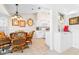 Cozy dining area with a view into the kitchen at 8041 Green Pines Ter, Spring Hill, FL 34606