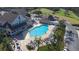 Resort-style pool with plenty of lounge chairs at 8041 Green Pines Ter, Spring Hill, FL 34606