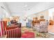 Spacious sunroom boasts ample natural light and comfortable furniture at 8041 Green Pines Ter, Spring Hill, FL 34606