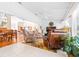Bright sunroom with large windows and comfortable seating at 8041 Green Pines Ter, Spring Hill, FL 34606