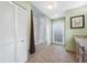 Bathroom with shower/tub combo, granite countertop, and linen closet at 8573 109Th Way, Seminole, FL 33772