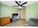 Bright bedroom with built-in desk and seating at 8573 109Th Way, Seminole, FL 33772