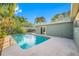 Relaxing rectangular pool with surrounding patio at 8573 109Th Way, Seminole, FL 33772