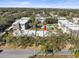 Aerial view of condo community with pool and surrounding area at 8755 Bardmoor Blvd # 105, Seminole, FL 33777